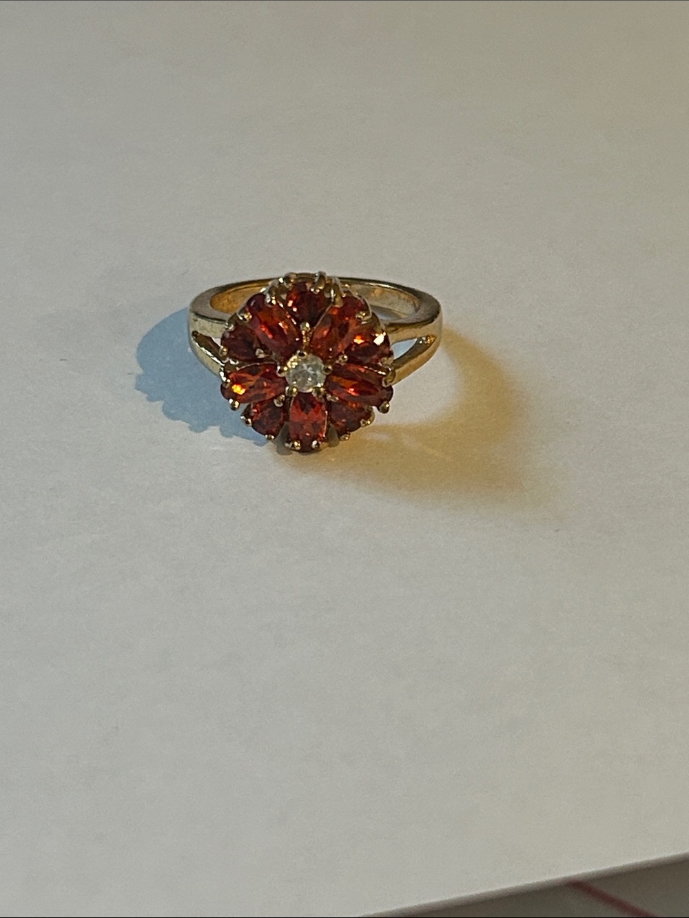 Gold Ring with Red Floral Cluster and Clear Center Stone
